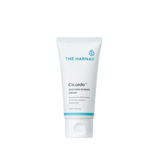 A white squeeze tube of The Harnay Cicaide Soothing Barrier Cream with blue text and logo, centered on a light blue gradient background.